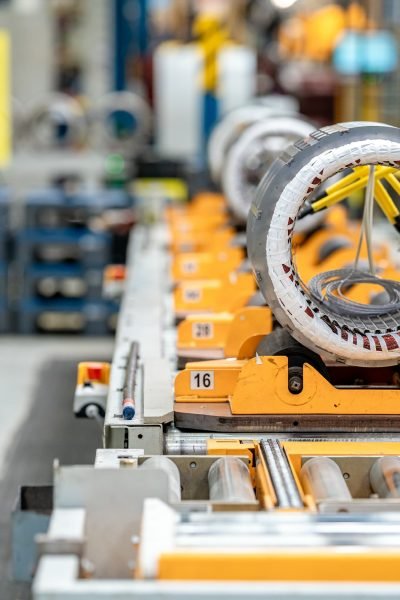 detail of the electric motor on the production line in the factory.